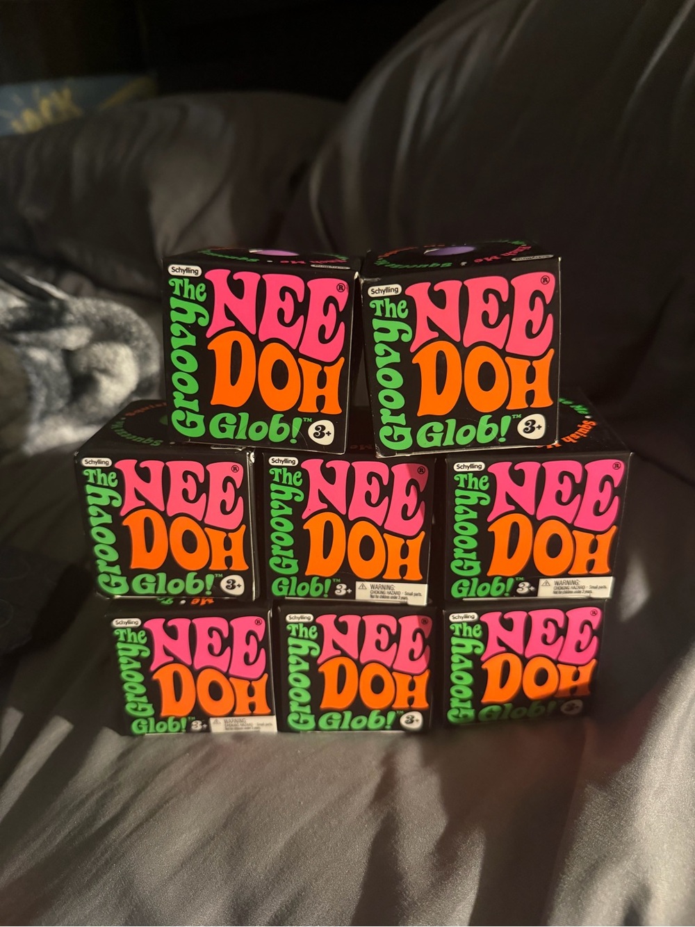 The Groovy NeeDoh Glob! Stress Ball - Pink & Orange Packaging